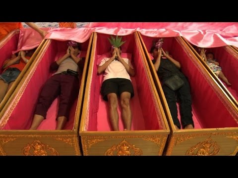Devotees cleansed of bad luck at Thai resurrection temple