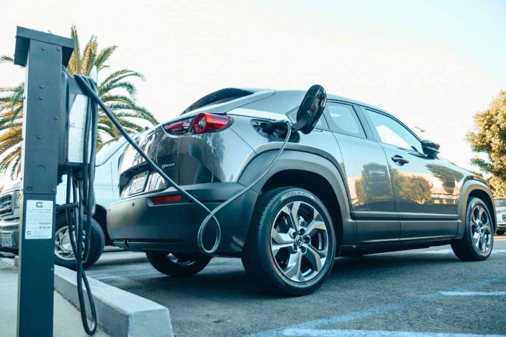 Electric car being recharged