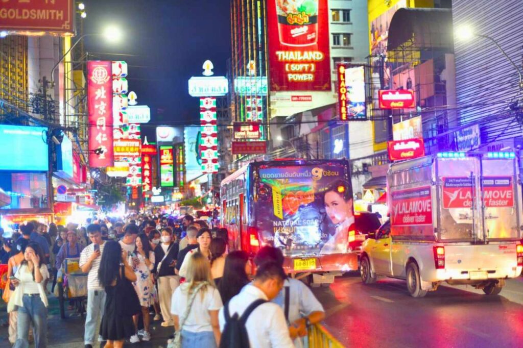 Locals and tourists in Yaowarat Street, Bangkok's Chinatown