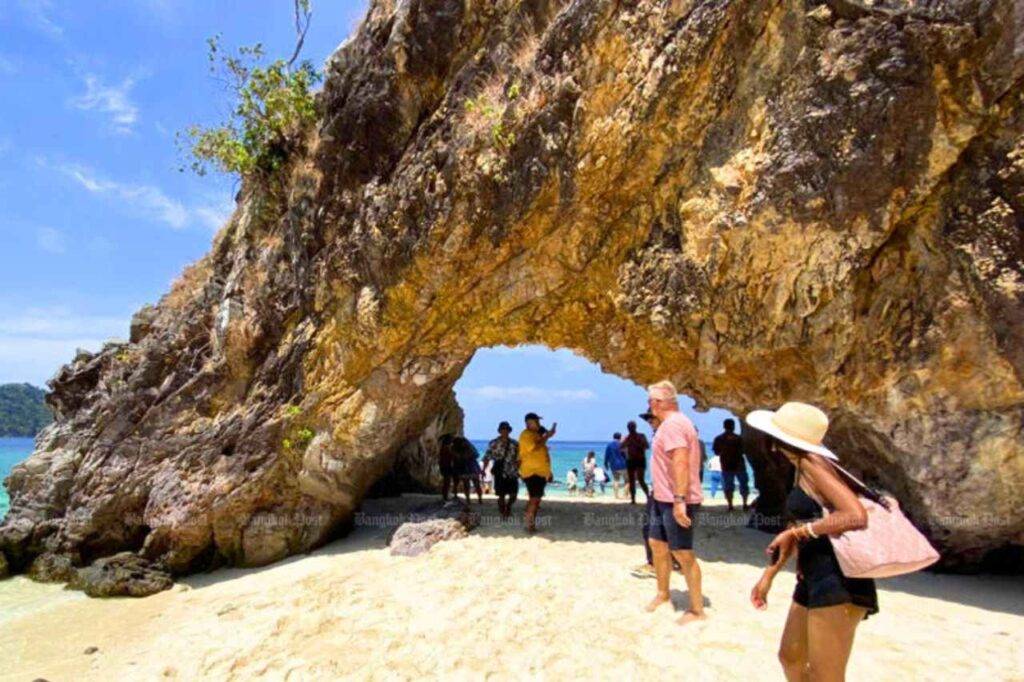Tourists visit Koh Khai Island in Tarutao National Park in Satun