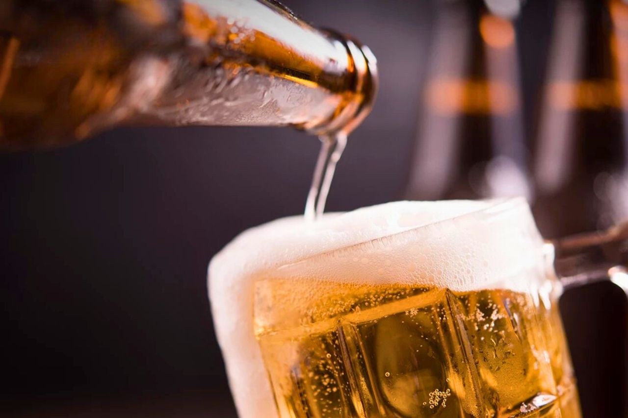 Beer poured into a glass.