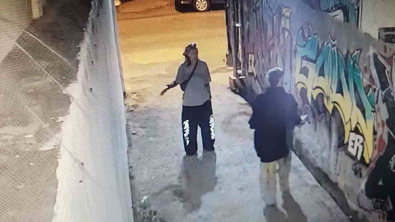 Photo taken from CCTV footage showing the two foreign graffiti artists