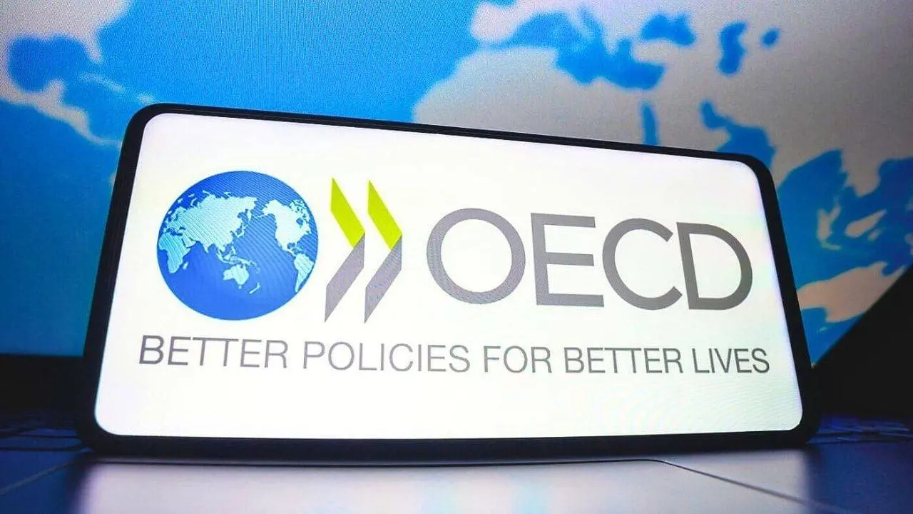 Slogan de l'OCDE sur un panneau
